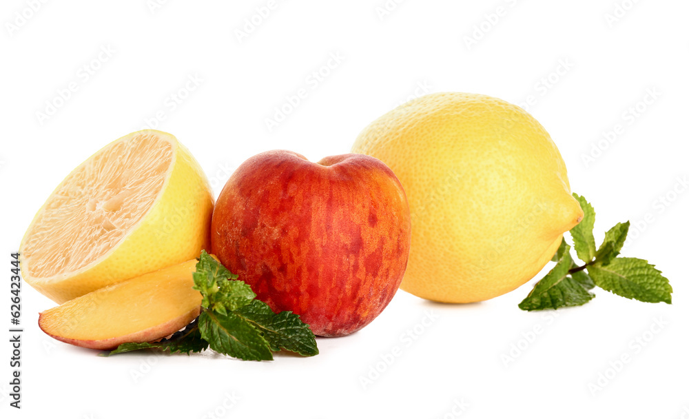 Fresh peach, lemons and mint on white background