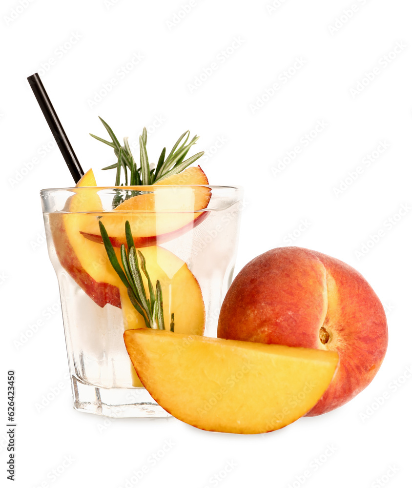 Glass of fresh peach lemonade with rosemary on white background