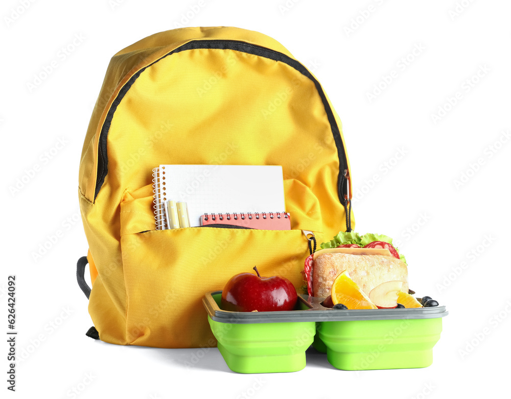 Backpack, stationery and lunchbox with delicious food isolated on white background