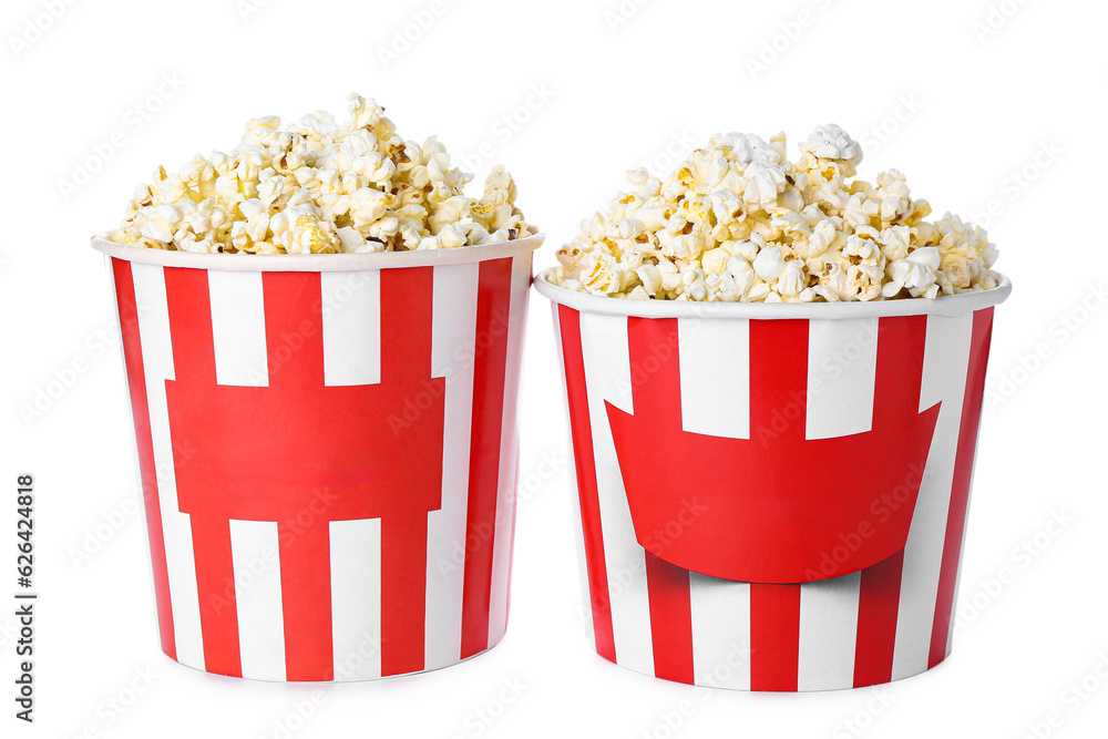 Buckets with tasty popcorn on white background