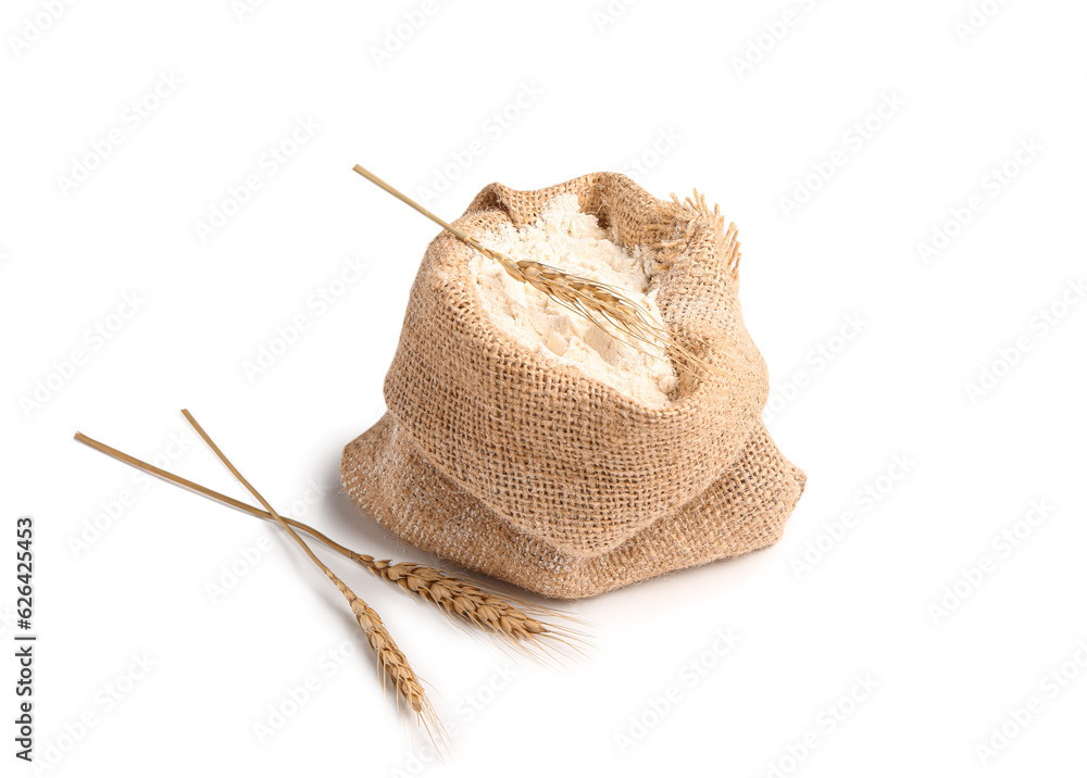 Sack bag with flour and wheat ears on white background