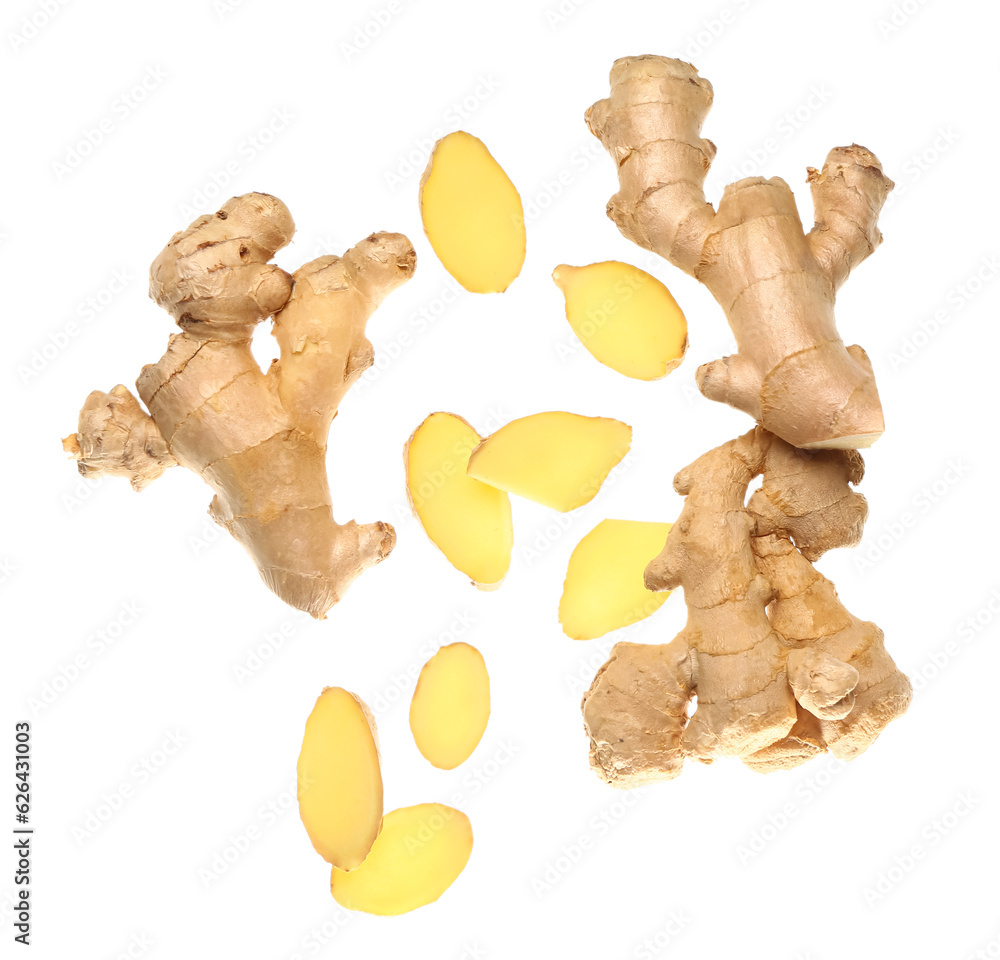 Flying fresh ginger roots on white background