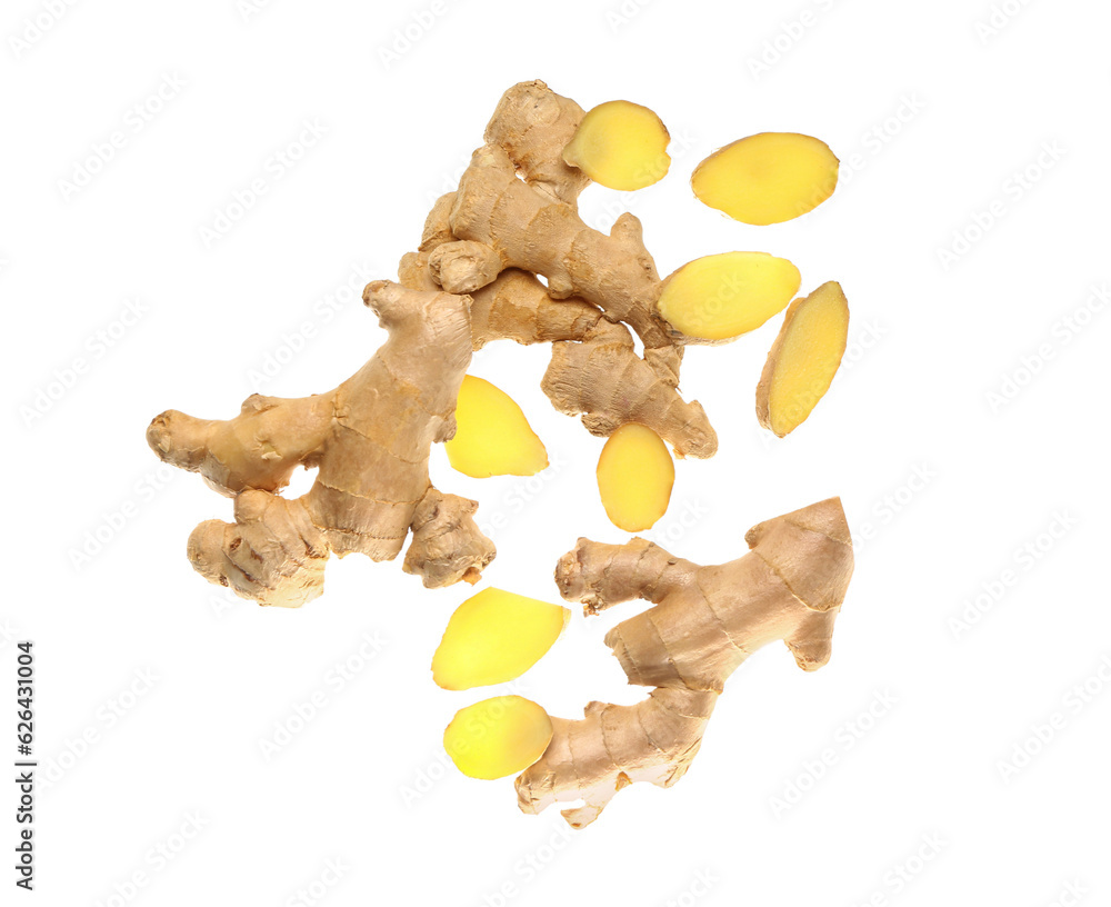 Flying fresh ginger roots on white background