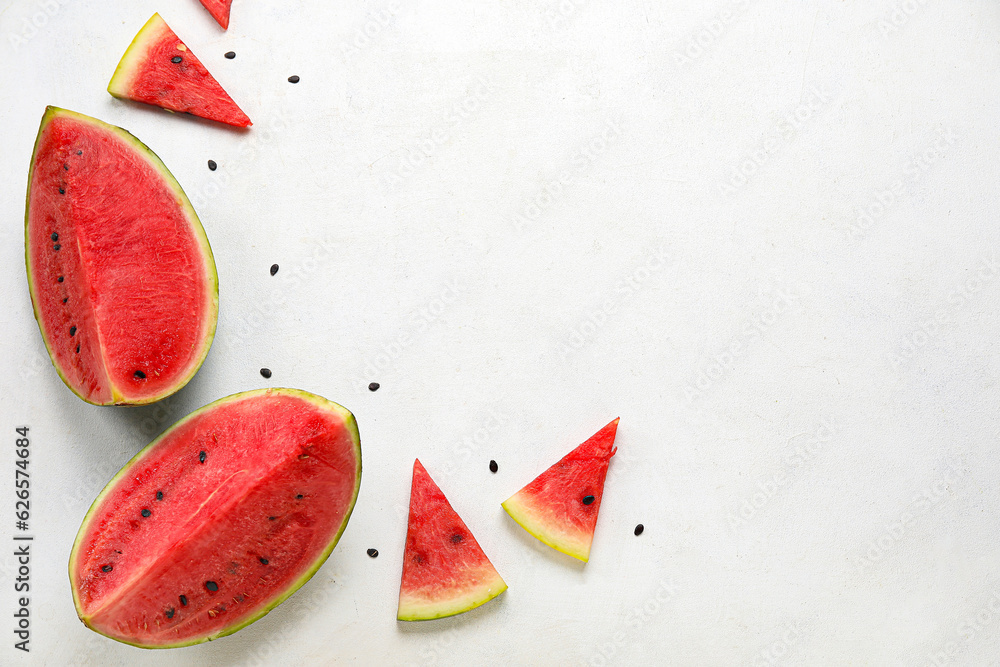 Composition with pieces of fresh ripe watermelon on white background