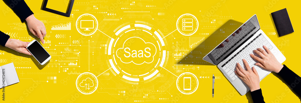 SaaS - software as a service concept with two people working together