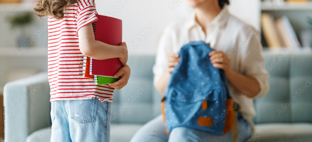 Happy family preparing for school