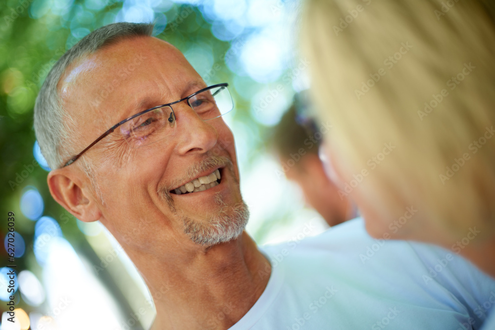 Admiring the love of his life. Shot of a mature man looking lovingly at his wife.