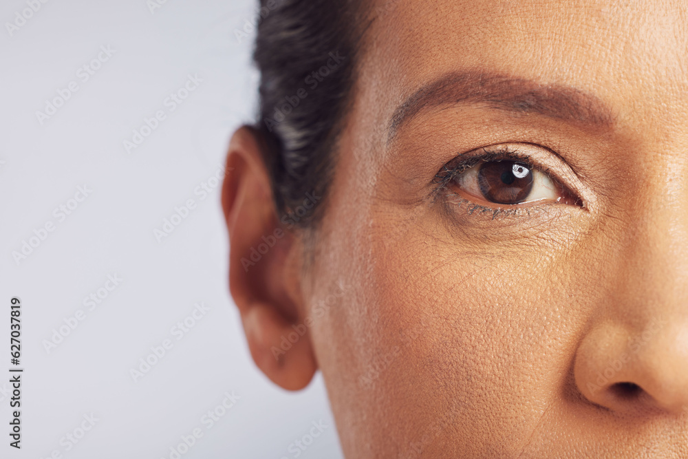 Beauty, eye closeup and woman in studio with vision for cosmetics and mature skincare. Isolated, gra