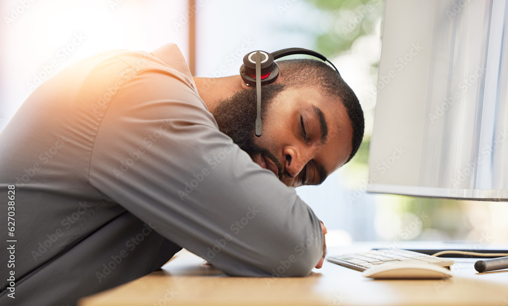 Black man, sleeping on desk and tired call center employee, insomnia or mental health problem with h