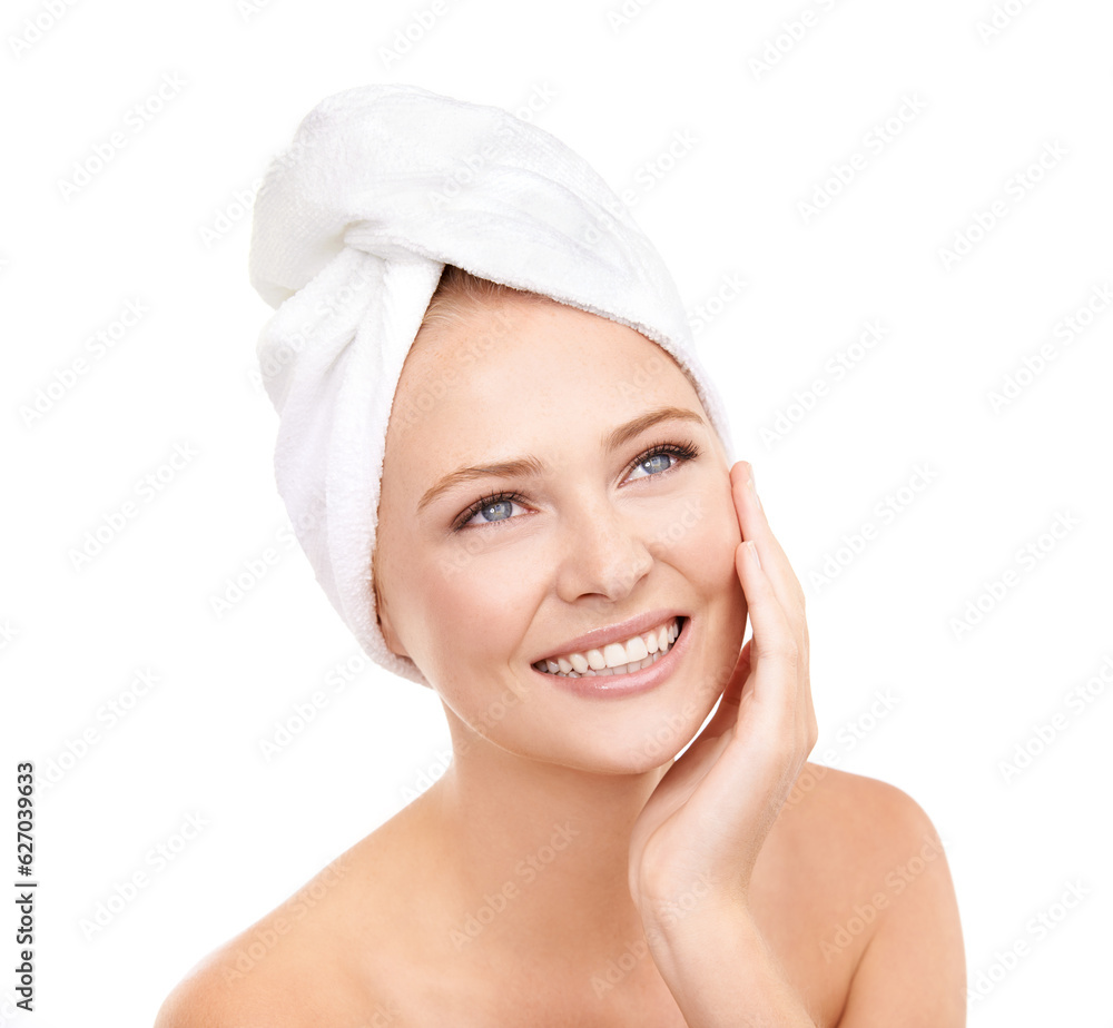 Beauty unmeasurable. Studio shot of a young woman with her head wrapped in a towel isolated on white