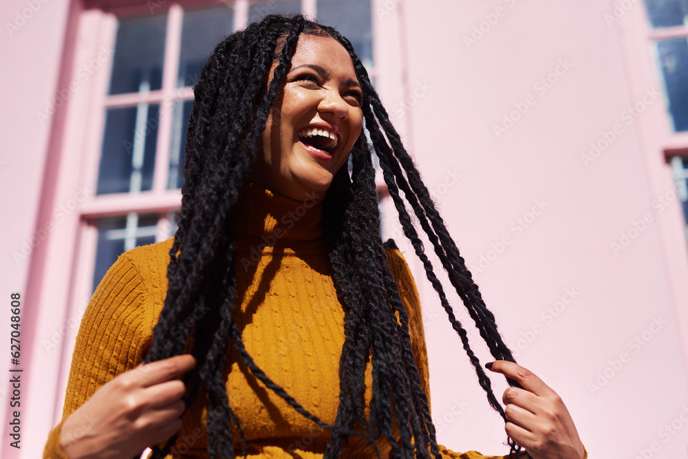 Focus on the good. Shot of a beautiful young woman posing against a pink wall.