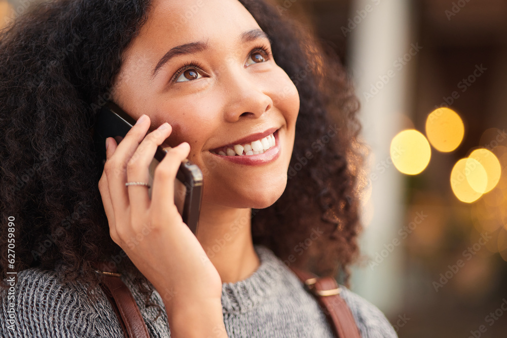 Phone call, happy and young woman in the city waiting for a cab, lift or public transport. Smile, co