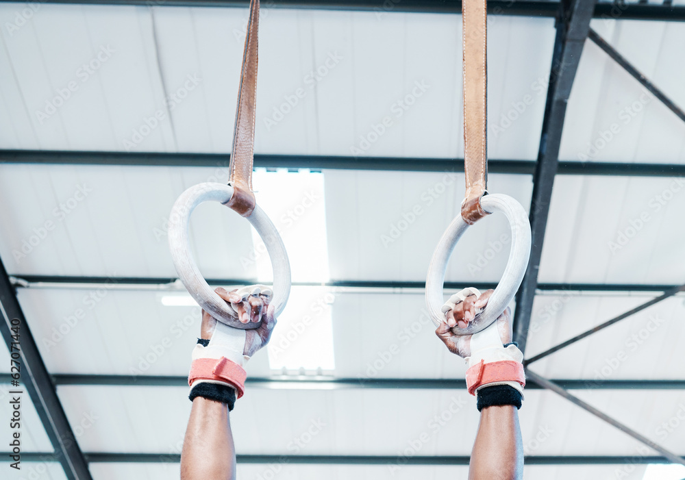 Hands, gymnastics ring and person in fitness for workout, strength training or competition. Closeup 