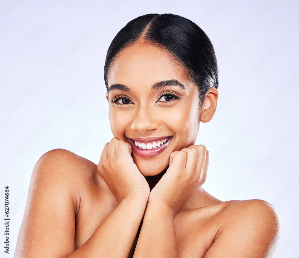 Portrait, smile and skincare with a model woman in studio on a gray background for natural wellness.