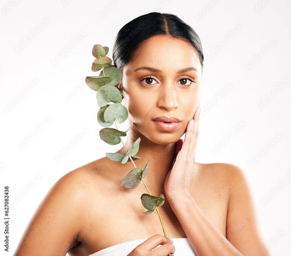 Woman, portrait and plant for natural skincare, beauty or nature cosmetics against a white studio ba