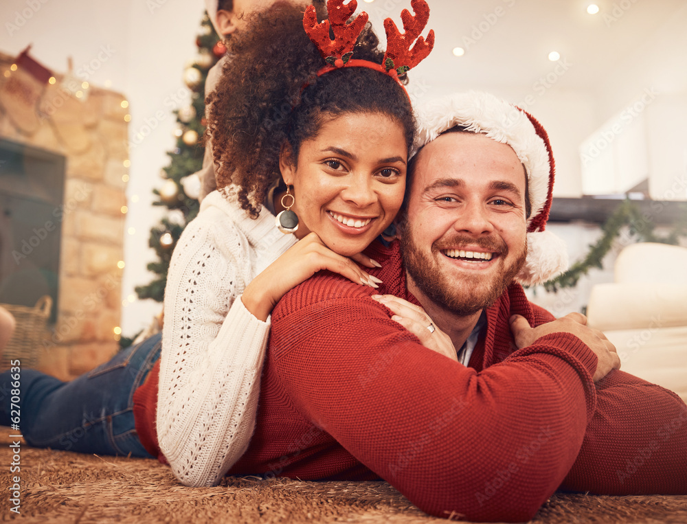 Christmas, portrait and happy couple in home on floor, bonding and together. Xmas, smile and face of