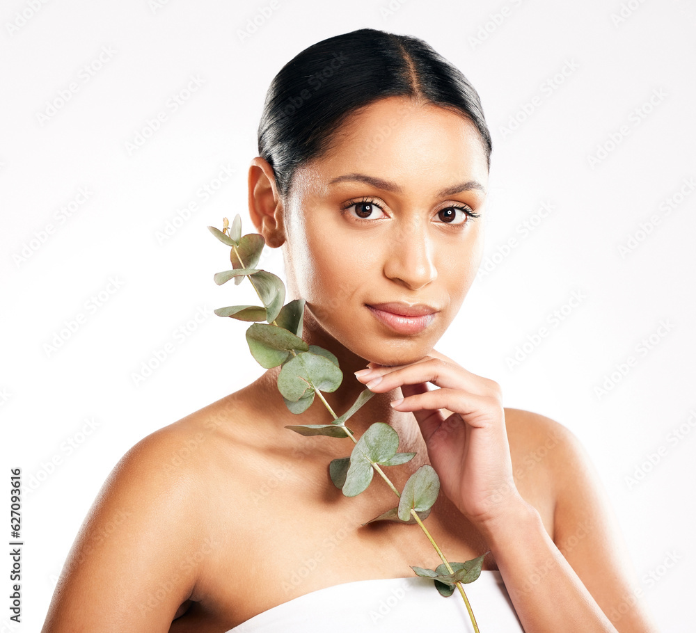 Woman, portrait and plant for natural healthcare, skincare or beauty against a white studio backgrou