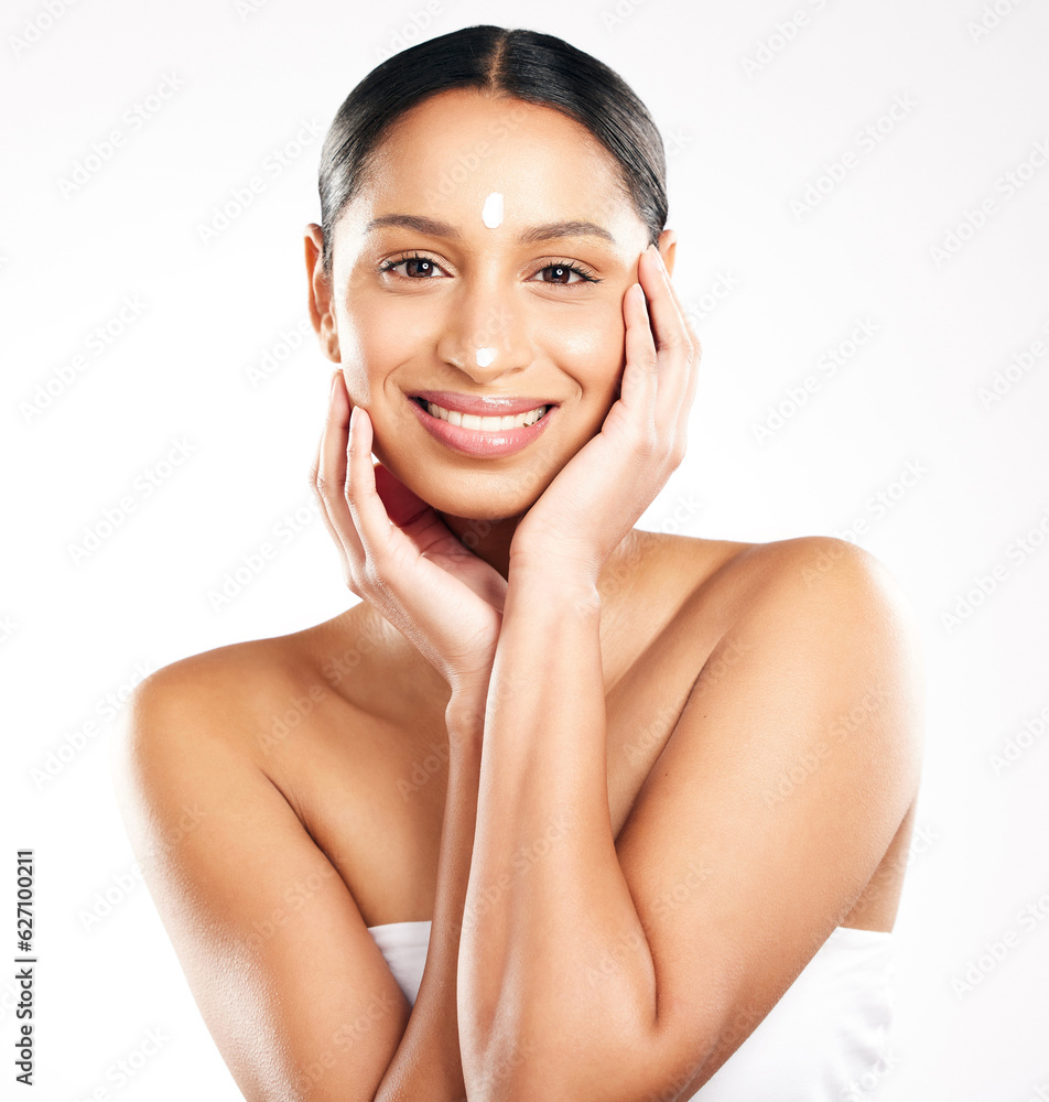 Happy woman, portrait and cream for skincare, beauty or cosmetics against a white studio background.