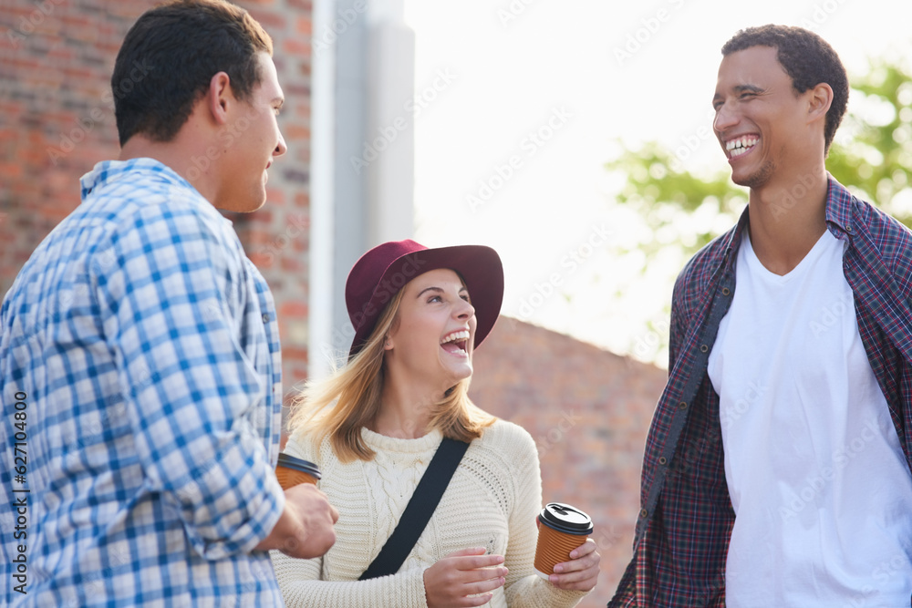 Cherishing their student years together. Cropped shot of a group of university students hanging out 