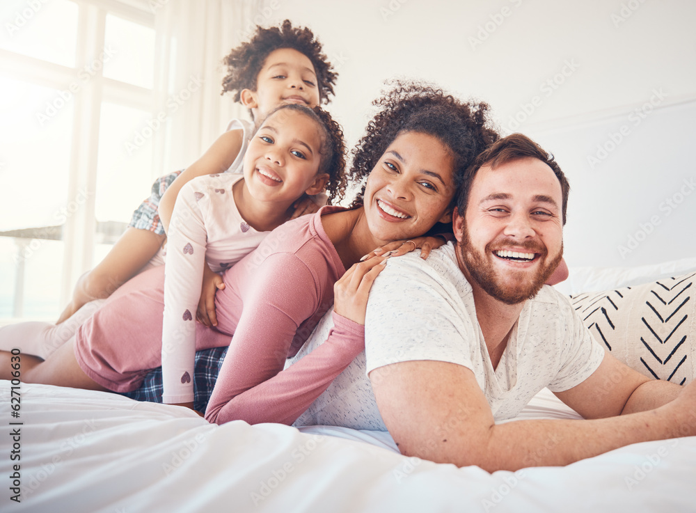 Happy family, portrait and relax on a bed, bond and having fun on the weekend in their home together