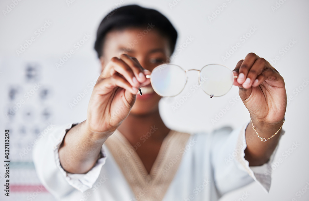 Hands, woman and optician with glasses for vision, eyesight and eye care prescription lens. Closeup 