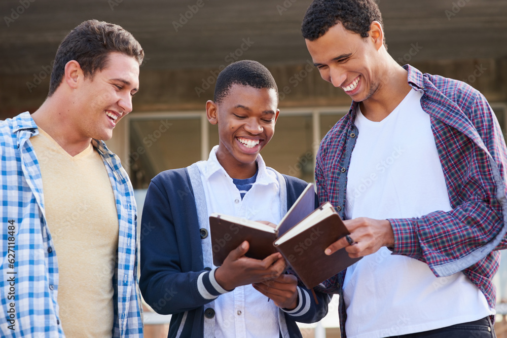 Comparing notes. Cropped shot of a group of university students looking through their notes together