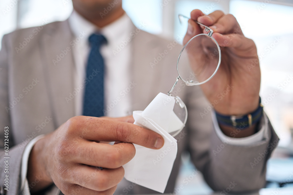 Lens, man and cleaning and glasses with hand or fabric in office to wipe dirt in blurry background. 