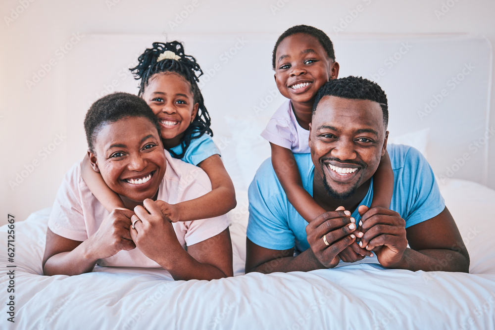 Smile, black family and portrait in a bed happy, care and comfort on the weekend in their home. Face