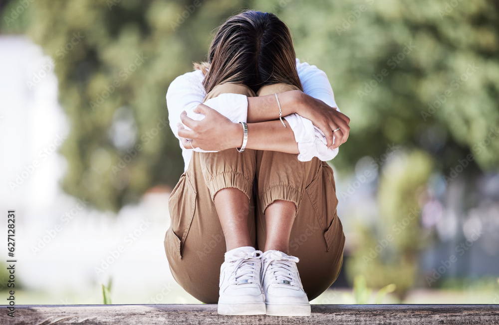 Sad, depression and student with woman in park for cry, frustrated and stress. Mental health, anxiet