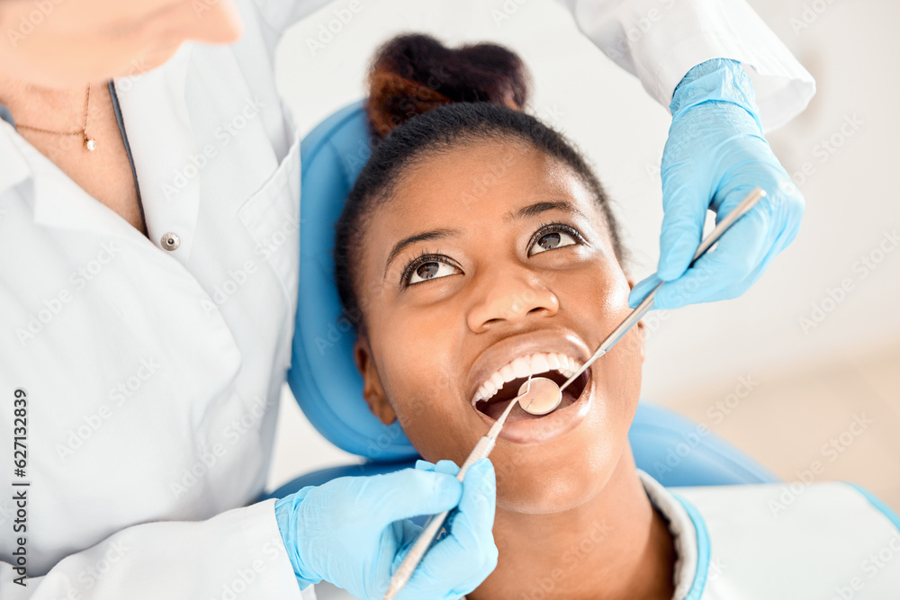 Dentist, black woman and mouth cleaning of patient at a clinic with medical and healthcare for teeth