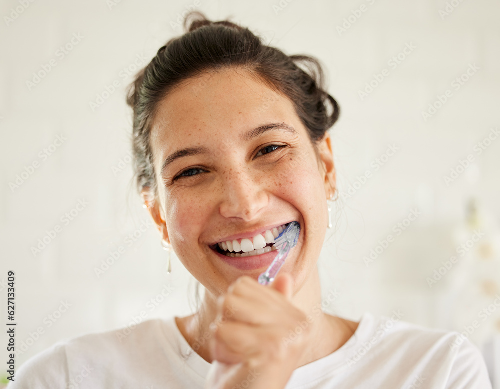 Healthcare, portrait of a woman brush her teeth and smile in her bathroom of her home. Hygiene or se