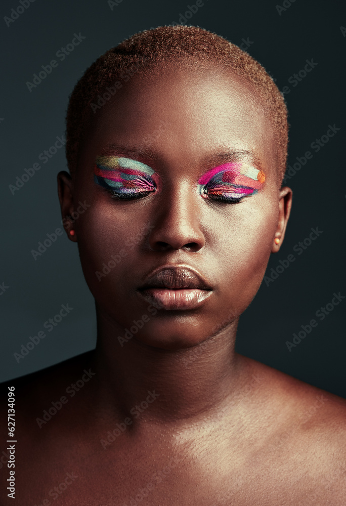 Who needs black and white when you can shine in color. Cropped shot of a beautiful woman wearing col