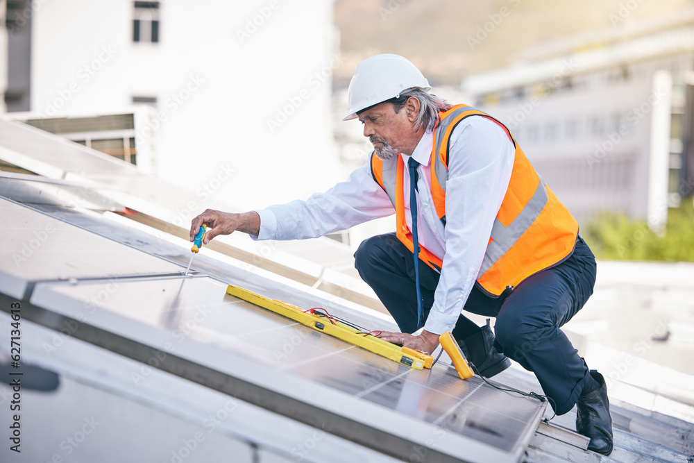 Solar panels, engineering man and tools in maintenance, energy saving builder and rooftop electricia