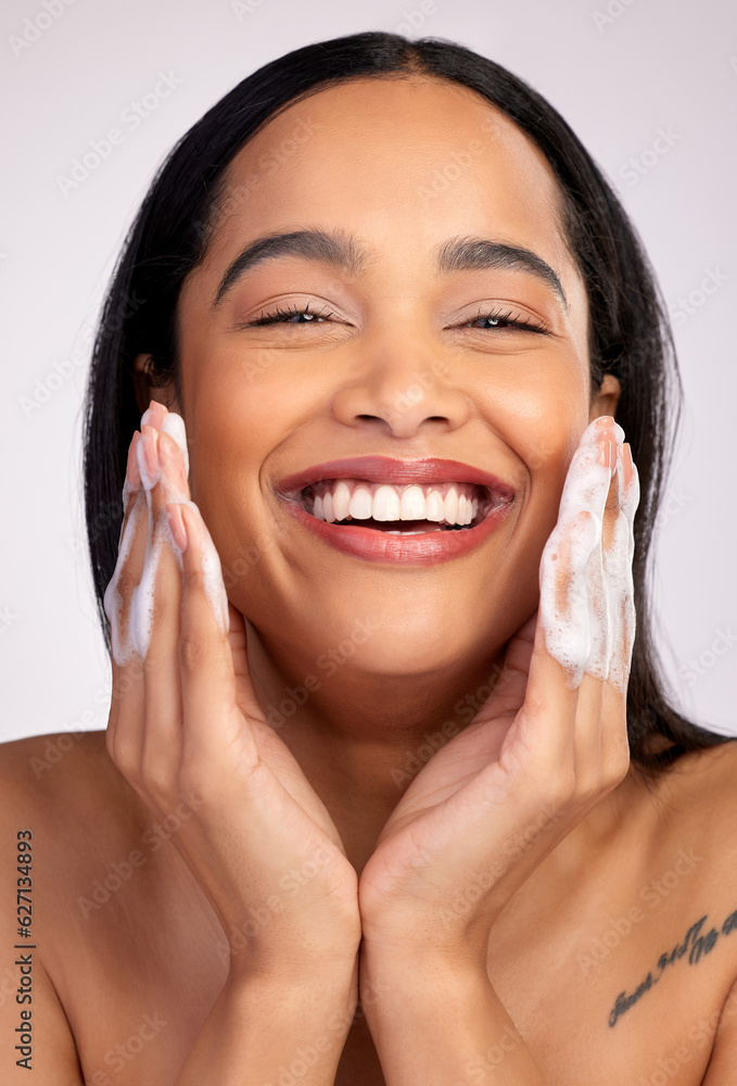 Happy woman, portrait and soap in face wash for skincare hygiene, cleaning or dermatology against a 