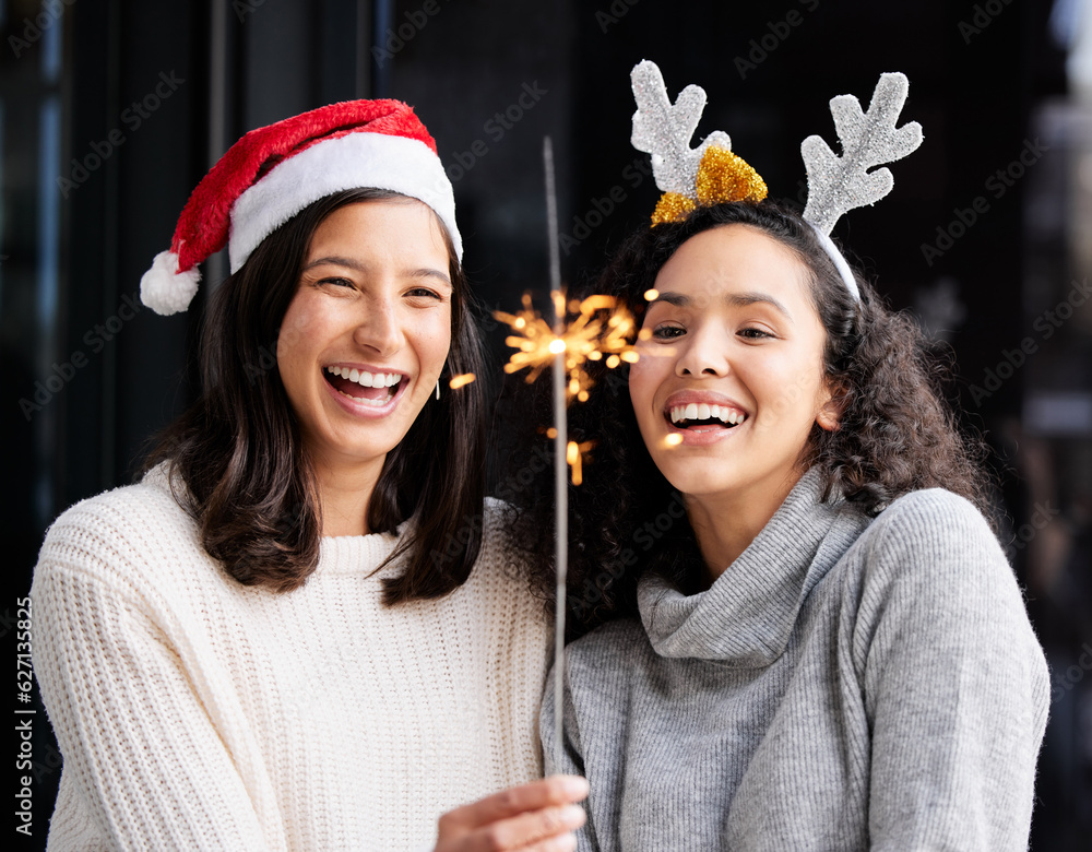 Women friends, Christmas and sparkle stick with smile, home and celebration of festive holiday. Girl