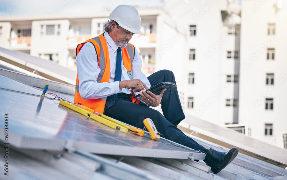 Tablet, solar panels and engineering man in city, rooftop and urban development, sustainability or e