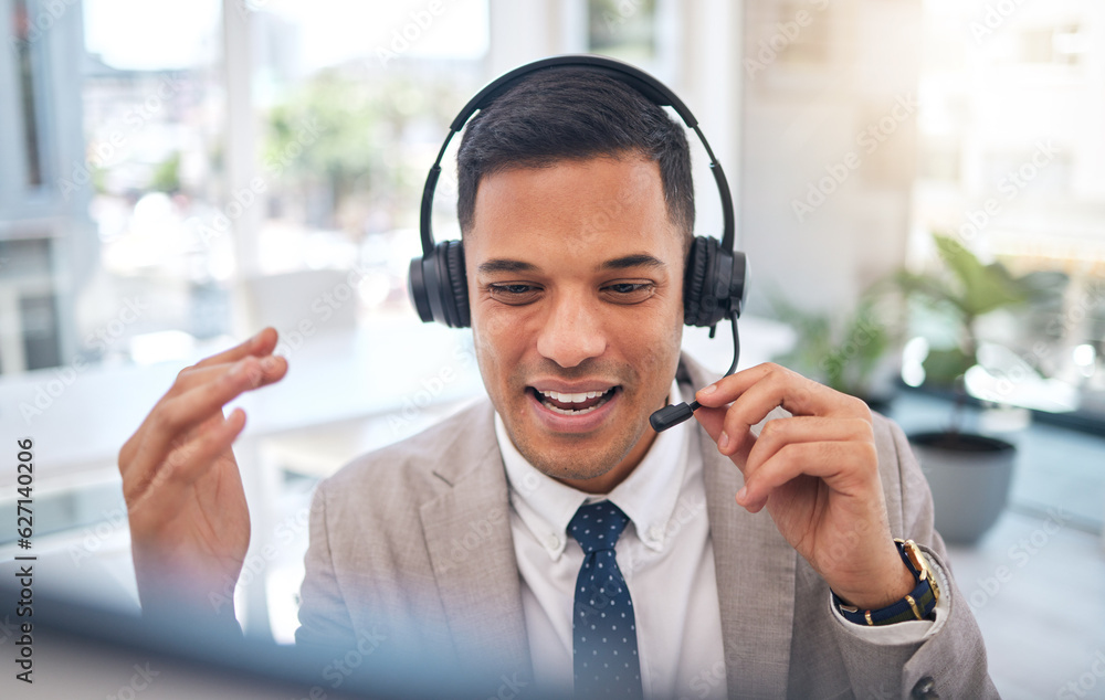 Happy man, call center and consulting on headphones in customer service, support or telemarketing at