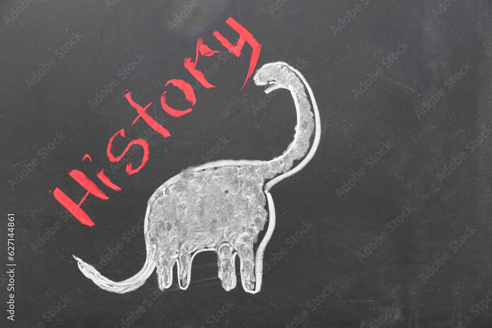 Drawn dinosaur and word HISTORY on black chalkboard