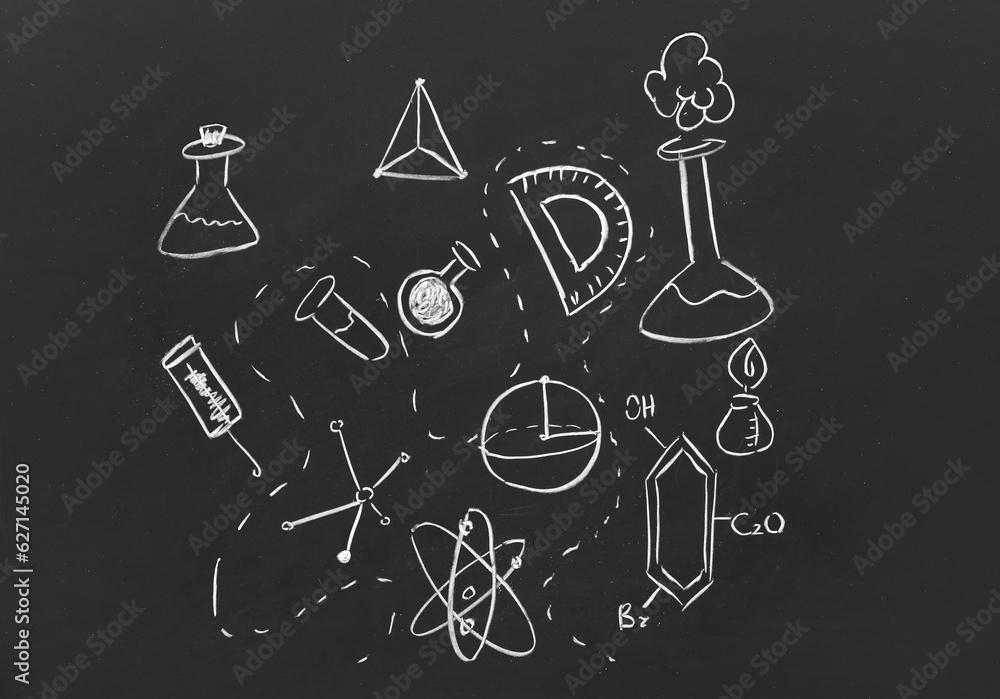 Different drawn physical and chemical symbols on black chalkboard