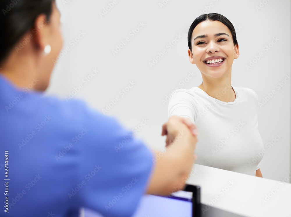 Handshake, nurse and woman at clinic reception, healthcare service and talking, questions or health 