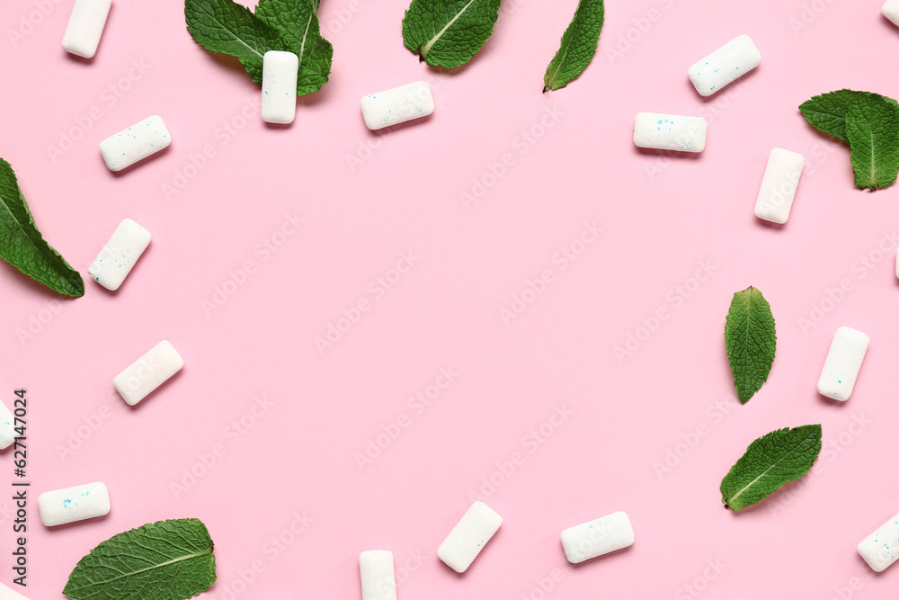 Frame made of fresh chewing gums with mint on pink background