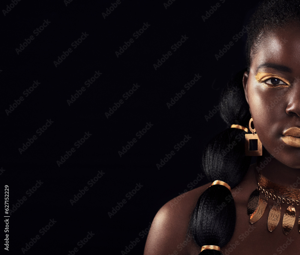 Half, portrait and black woman in studio with gold, luxury and makeup on black background. Glitter, 