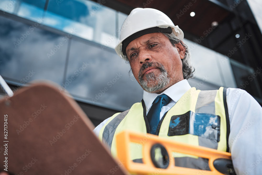 Architecture, checklist and man with tools for construction site inspection, compliance or project m