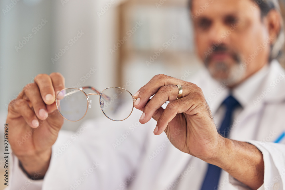 Optometrist, man and glasses in hand for vision or eyesight or prescription lens for worker. Doctor,