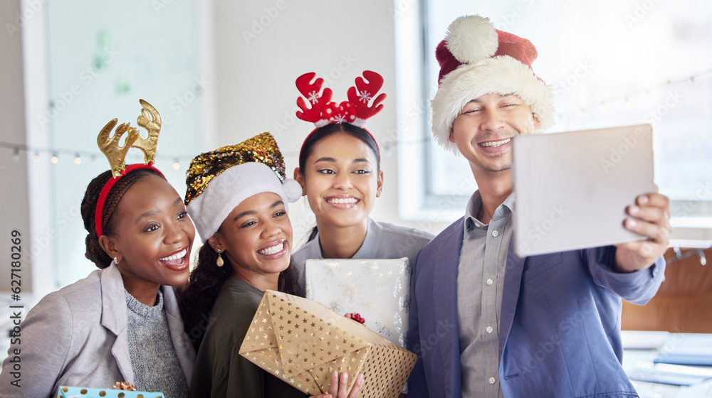 Christmas, selfie and tablet with business people in office for social media, celebration and xmas. 