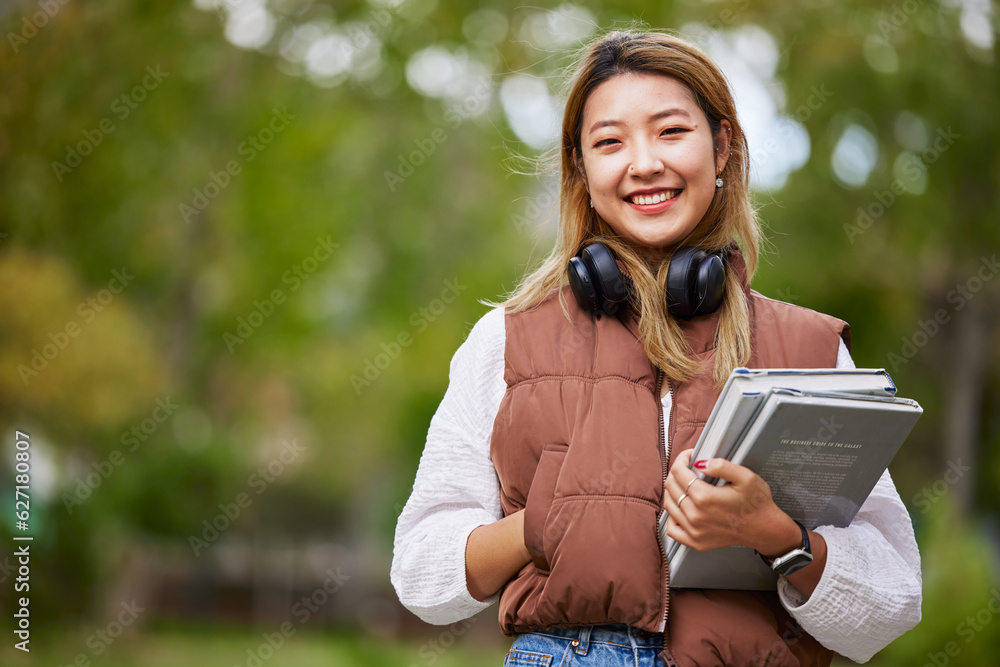 Student with headphones, portrait and woman with books for learning, education and on university cam