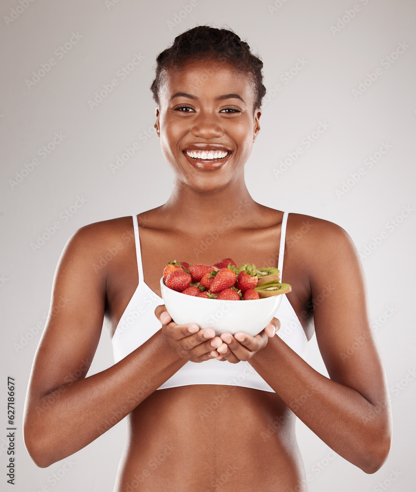 Healthy, portrait and black woman with fruit on a studio background for a diet to lose weight. Happy