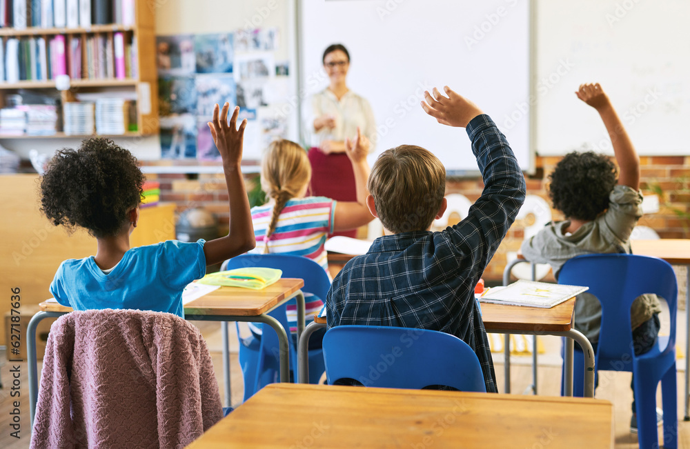 Education, question with group of children in classroom and raise their hands to answer. Learning or