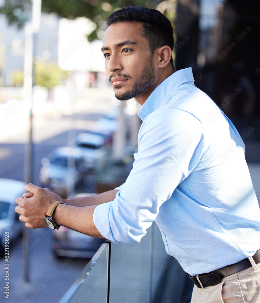 Thinking, vision and a business man on the balcony of his office looking at the city for inspiration