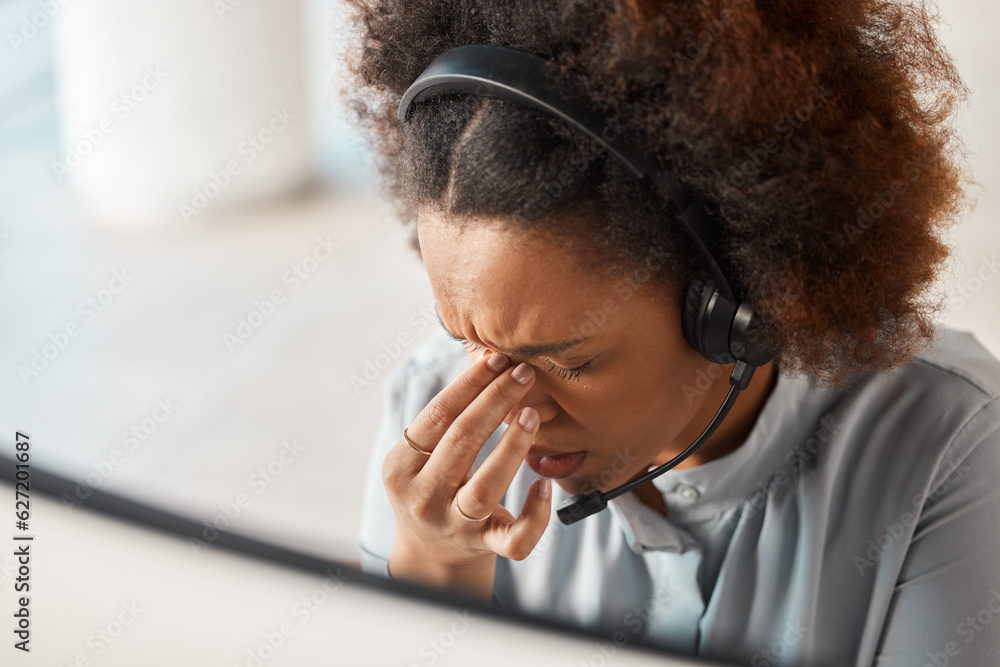 Woman, headache and call center in office, headphones and microphone for crm expert with pain. Afric